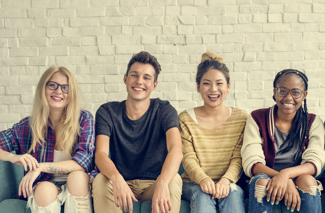 Group of smiling teenagers