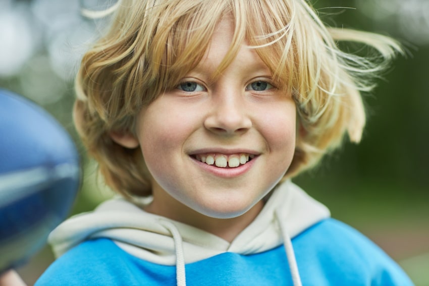 child smiling after therapy in heathfield