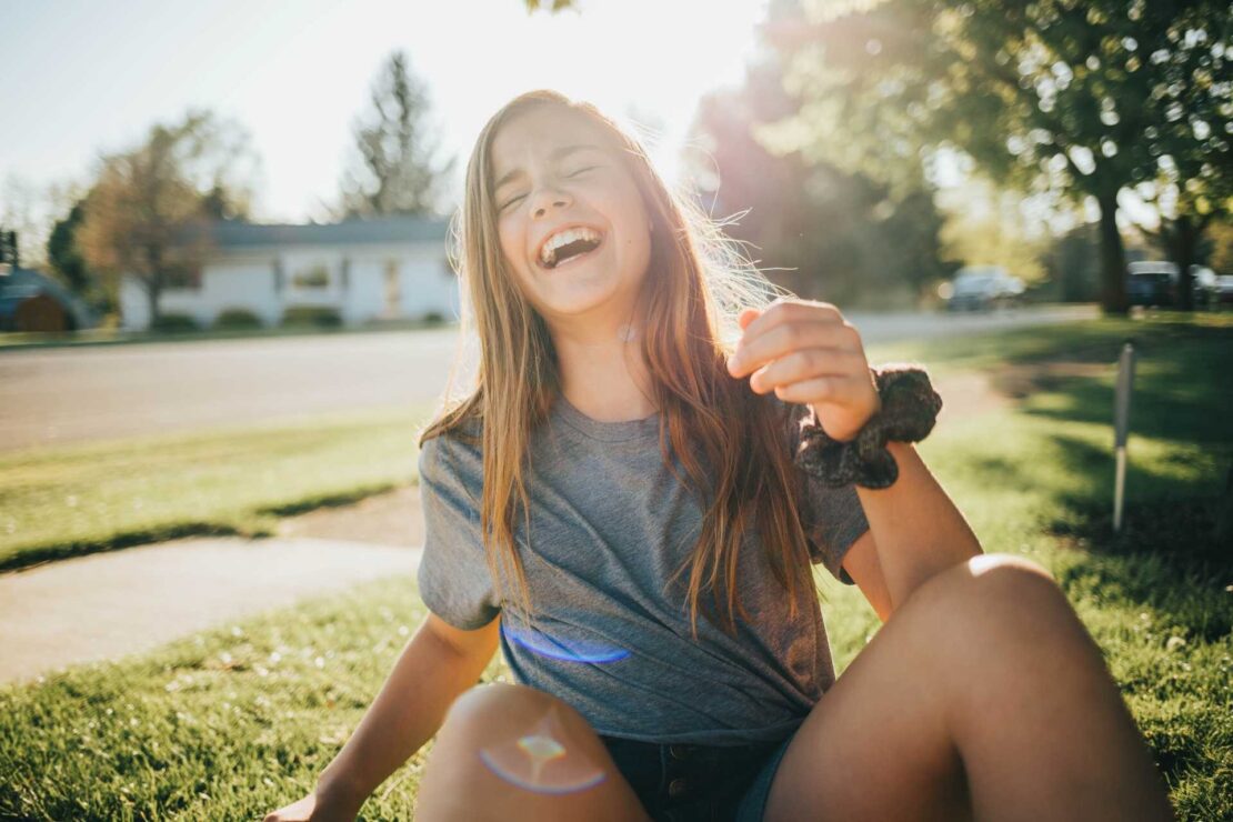 teen girl laughing in the sunlight, teenage therapist lightwater